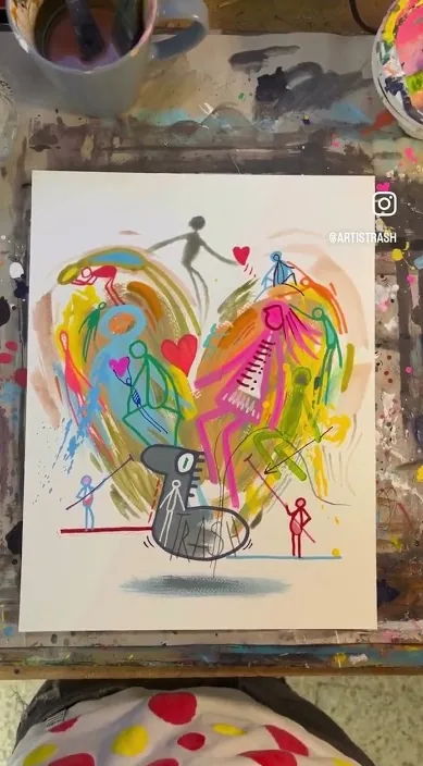 小さな人物で満たされたハートを描いたカラフルな絵、Art Is Trash の作品、バルセロナ